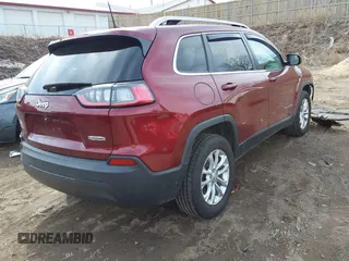 2019 Jeep Cherokee Latitude with VIN 1C4PJMCB2KD125898, listed as a IAAI auction lot 41809073 with 88,774 mi miles. Bid and sale history available at carsss.com. Image 4.