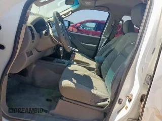 2015 Nissan Frontier SV with VIN 1N6AD0ER8FN709073, listed as a Copart auction lot 57821555 with 191,708 mi miles and Salvage title. Bid and sale history available at DreamBid. Image 7.