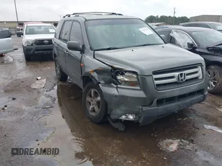 2007 Honda Pilot EX-L with VIN 5FNYF18697B002843, listed as a IAAI auction lot 41549328 with 202,365 mi miles and . Bid and sale history available at carsss.com. Image 1.