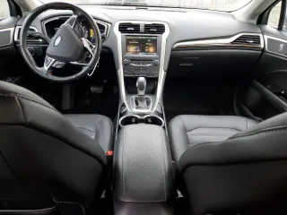 2015 Ford Fusion Energi SE Luxury with VIN 3FA6P0PU8FR245125, listed as a Copart auction lot 89162575 with 100,297 mi miles and Salvage Title. Bid and sale history available at carsss.com. Image 8.