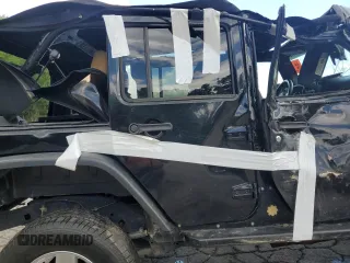 2012 Jeep Wrangler Unlimited Sport z VIN 1C4BJWDG7CL208265, wystawiony jako Copart lot #56101095 z przebiegiem 141 527 mil mil oraz Szkoda całkowita • Salvage title. Historia ofert i sprzedaży dostępna na DreamBid. Obrazek 10.