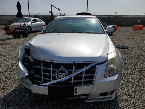 2012 Cadillac CTS Performance z VIN 1G6DK5E34C0106681, wystawiony jako Copart lot #55050665 z przebiegiem 151 396 mil mil oraz Szkoda całkowita • Salvage title. Historia ofert i sprzedaży dostępna na DreamBid. Obrazek 5.