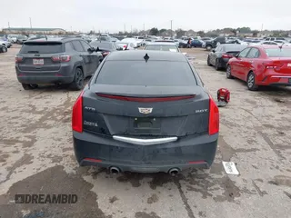 2018 Cadillac ATS RWD z VIN 1G6AA5RX7J0183805, wystawiony jako IAAI lot #41398076 z przebiegiem 103 784 mil mil oraz . Historia ofert i sprzedaży dostępna na DreamBid. Obrazek 16.