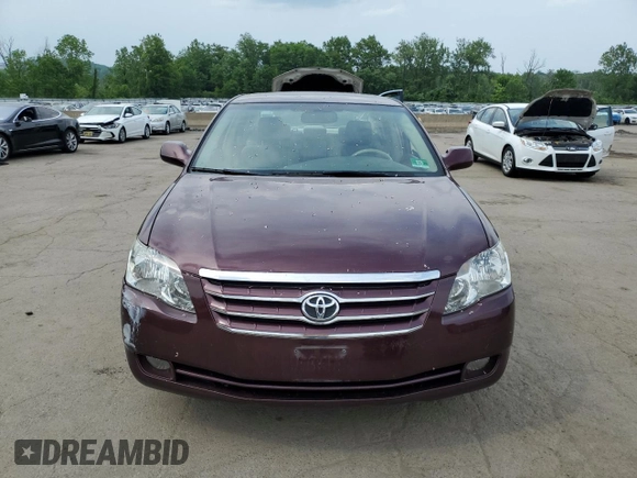 2006 Toyota Avalon XL z VIN 4T1BK36B36U084230, wystawiony jako Copart lot #59911975 z przebiegiem 134 984 mil mil oraz Szkoda całkowita • Salvage title. Historia ofert i sprzedaży dostępna na DreamBid. Obrazek 5.