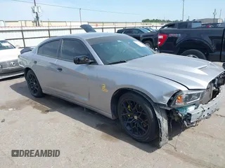 2014 Dodge Charger RT z VIN 2C3CDXCT4EH368849, wystawiony jako IAAI lot #42262027 z przebiegiem 151 103 mil mil oraz . Historia ofert i sprzedaży dostępna na DreamBid. Obrazek 1.
