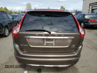 2015 Volvo XC60 T5 z VIN YV4612RK4F2673990, wystawiony jako Copart lot #52303935 z przebiegiem 78 868 mil mil oraz Szkoda całkowita • Salvage title. Historia ofert i sprzedaży dostępna na DreamBid. Obrazek 6.
