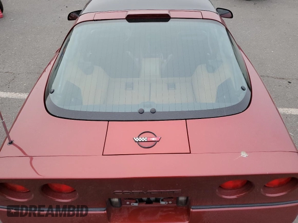 1988 Chevrolet Corvette z VIN 1G1YY2189J5122249, wystawiony jako Copart lot #89153215 z przebiegiem Nie podano mil oraz Szkoda całkowita • Salvage title. Historia ofert i sprzedaży dostępna na DreamBid. Obrazek 10.