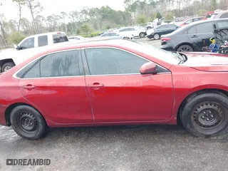 2015 Toyota Camry XLE with VIN 4T1BF1FK2FU982570, listed as a IAAI auction lot 41629755 with 245,224 mi miles. Bid and sale history available at carsss.com. Image 13.