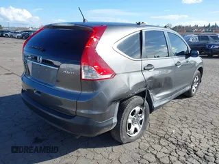 2014 Honda CR-V LX with VIN 2HKRM4H3XEH621242, listed as a IAAI auction lot 41734669 with 127,664 mi miles. Bid and sale history available at carsss.com. Image 4.