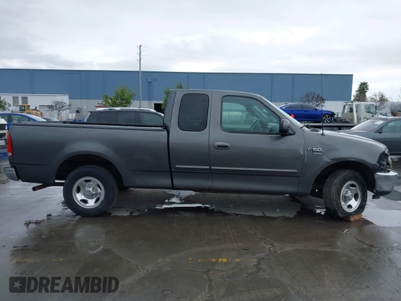 2003 Ford F-150 XL with VIN 1FTRX17W03NB51687, listed as a IAAI auction lot 41712022 with 183,428 mi miles. Bid and sale history available at carsss.com. Image 13.