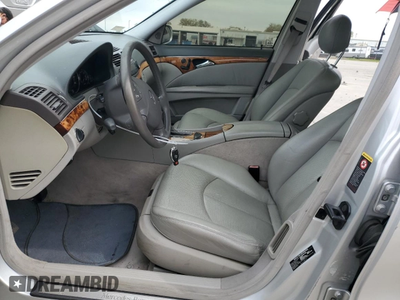 2003 Mercedes-Benz E-Class 5.0L with VIN WDBUF70J03A112909, listed as a Copart auction lot 49924865 with 158,244 mi miles and Salvage Title. Bid and sale history available at carsss.com. Image 7.
