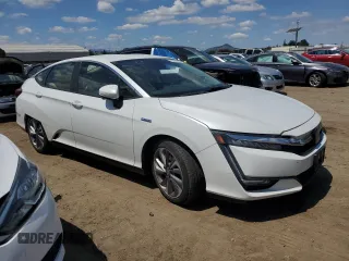 2019 Honda Clarity Plug-In Hybrid with VIN JHMZC5F10KC004142, listed as a Copart auction lot 55056875 with 70,804 mi miles and Salvage Title. Bid and sale history available at carsss.com. Image 4.