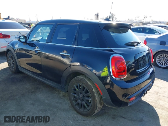 2019 MINI Hardtop 4 Door Cooper S with VIN WMWXU3C58K2H88917, listed as a IAAI auction lot 41750484 with 49,455 mi miles and . Bid and sale history available at DreamBid. Image 3.