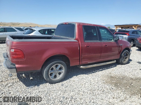 2001 Ford F-150 XLT with VIN 1FTRW07W71KE22482, listed as a Copart auction lot 62546815 with 218,501 mi miles and Clean title. Bid and sale history available at DreamBid. Image 3.