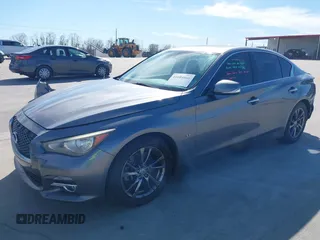 2015 Infiniti Q50 Premium with VIN JN1BV7AP0FM355933, listed as a IAAI auction lot 41684066 with 116,230 mi miles and . Bid and sale history available at DreamBid. Image 18.