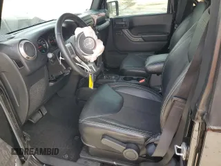 2016 Jeep Wrangler Sport with VIN 1C4AJWAG6GL196891, listed as a Copart auction lot 51148825 with 128,245 mi miles and Salvage Title. Bid and sale history available at carsss.com. Image 7.