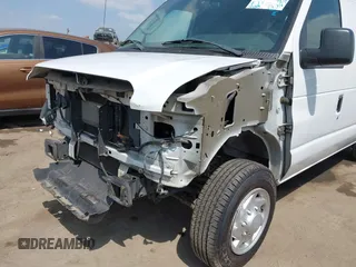 2014 Ford Econoline Cargo Commercial with VIN 1FTNE1EW4EDA07818, listed as a IAAI auction lot 42096865 with 164,049 mi miles and . Bid and sale history available at DreamBid. Image 6.