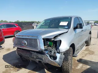 2011 Toyota Tundra with VIN 5TFRM5F18BX033833, listed as a IAAI auction lot 42257200 with 108,046 mi miles and . Bid and sale history available at DreamBid. Image 17.