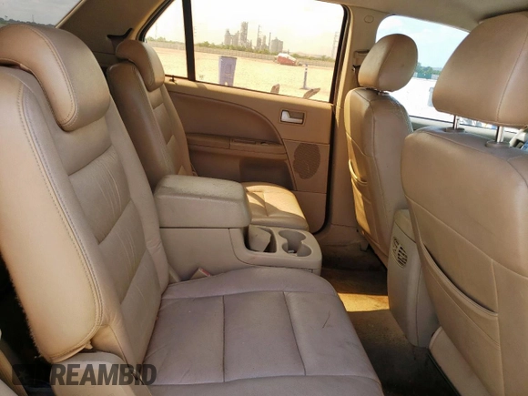 2005 Ford Freestyle SE with VIN 1FMZK01105GA54885, listed as a Copart auction lot 58414145 with 306,275 mi miles and Salvage title. Bid and sale history available at DreamBid. Image 11.