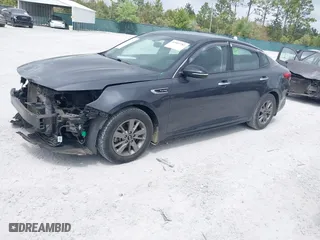 2017 Kia Optima LX 1.6T with VIN 5XXGT4L15HG171337, listed as a IAAI auction lot 41953782 with 174,121 mi miles. Bid and sale history available at carsss.com. Image 2.