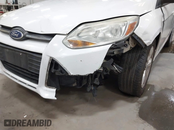 2013 Ford Focus SE with VIN 1FADP3F21DL341649, listed as a IAAI auction lot 42465450 with 180,219 mi miles and . Bid and sale history available at DreamBid. Image 19.