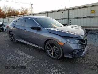 2019 Honda Civic Sport with VIN 2HGFC2F84KH507235, listed as a Copart auction lot 82616034 with 95,751 mi miles and Salvage title. Bid and sale history available at DreamBid. Image 4.