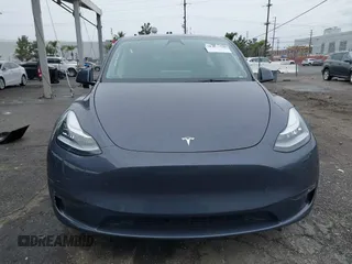 2023 Tesla Model Y Long Range with VIN 7SAYGDEE3PA152683, listed as a IAAI auction lot 41798988 with 14,063 mi miles and . Bid and sale history available at carsss.com. Image 12.