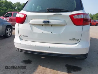 2014 Ford C-Max SE z VIN 1FADP5AU3EL511743, wystawiony jako IAAI lot #42404031 z przebiegiem 125 492 mil mil oraz . Historia ofert i sprzedaży dostępna na DreamBid. Obrazek 6.