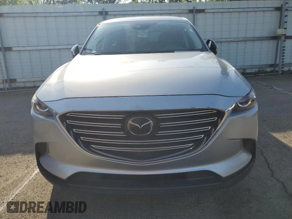 2018 Mazda CX-9 Touring z VIN JM3TCACY4J0219449, wystawiony jako Copart lot #61949725 z przebiegiem 134 904 mil mil oraz Czysty tytuł • Clean title. Historia ofert i sprzedaży dostępna na DreamBid. Obrazek 5.