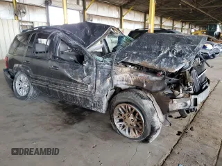 2002 Jeep Grand Cherokee Limited with VIN 1J8GX58N72C294837, listed as a Copart auction lot 56201145 with 218,345 mi miles and Salvage Title. Bid and sale history available at DreamBid. Image 4.