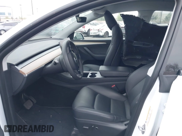 2023 Tesla Model Y Long Range z VIN 7SAYGDEE5PA063097, wystawiony jako IAAI lot #42171871 z przebiegiem Nie podano mil oraz . Historia ofert i sprzedaży dostępna na DreamBid. Obrazek 5.