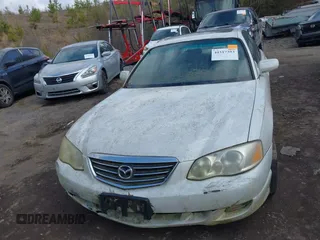 2001 Mazda Millenia z VIN JM1TA221211708077, wystawiony jako IAAI lot #41517393 z przebiegiem 269 771 mil mil oraz . Historia ofert i sprzedaży dostępna na DreamBid. Obrazek 6.