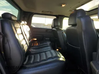 2005 Hummer H2 SUT with VIN 5GRGN22U85H109003, listed as a Copart auction lot 76557734 with 115,249 mi miles and Salvage Title. Bid and sale history available at carsss.com. Image 11.