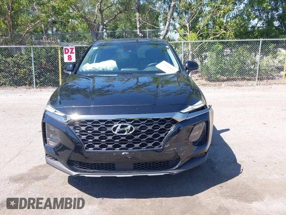 2019 Hyundai Santa Fe SE with VIN 5NMS23AD4KH088902, listed as a IAAI auction lot 42044465 with 34,302 mi miles and . Bid and sale history available at DreamBid. Image 12.