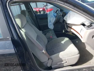2004 Chevrolet Impala with VIN 2G1WF52E349136173, listed as a IAAI auction lot 41572743 with 163,280 mi miles. Bid and sale history available at carsss.com. Image 5.