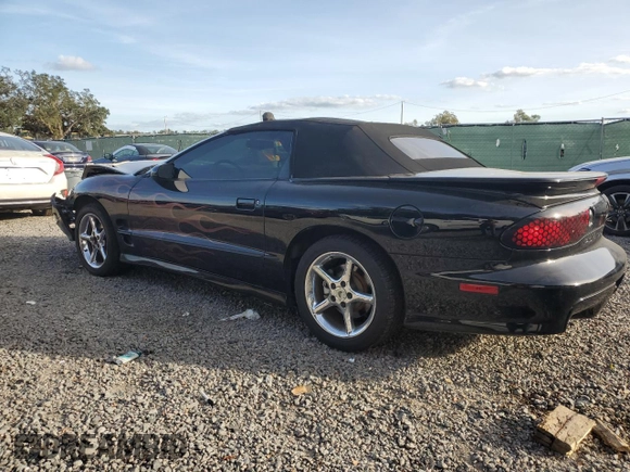 1999 Pontiac Firebird Trans Am with VIN 2G2FV32G1X2217352, listed as a Copart auction lot 79941714 with 174,580 mi miles and Salvage title. Bid and sale history available at DreamBid. Image 2.