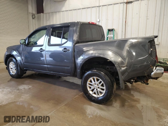2015 Nissan Frontier Pro-4X with VIN 1N6AD0EV8FN703027, listed as a Copart auction lot 55217005 with 175,794 mi miles and Salvage title. Bid and sale history available at DreamBid. Image 2.
