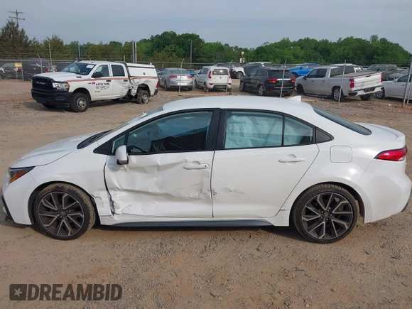 2022 Toyota Corolla SE with VIN 5YFS4MCE0NP136332, listed as a IAAI auction lot 42094001 with 36,371 mi miles and . Bid and sale history available at DreamBid. Image 14.