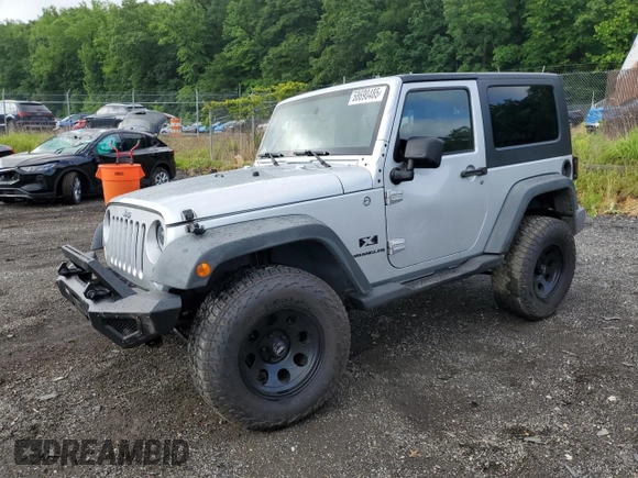 2007 Jeep Wrangler X with VIN 1J4FA24117L202404, listed as a Copart auction lot 58690485 with 126,347 mi miles and Salvage title. Bid and sale history available at DreamBid. Image 1.