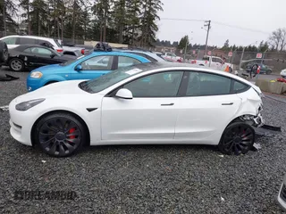 2023 Tesla Model 3 Performance z VIN 5YJ3E1EC9PF545648, wystawiony jako IAAI lot #41573583 z przebiegiem 15 207 mil mil oraz . Historia ofert i sprzedaży dostępna na DreamBid. Obrazek 14.