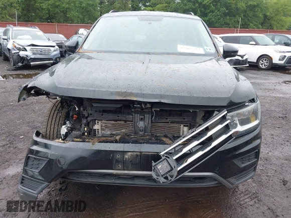 2021 Volkswagen Tiguan S z VIN 3VV0B7AX3MM031908, wystawiony jako IAAI lot #42504384 z przebiegiem 42 510 mil mil oraz . Historia ofert i sprzedaży dostępna na DreamBid. Obrazek 18.