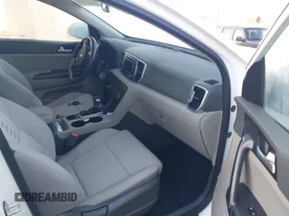 2018 Kia Sportage LX z VIN KNDPMCAC3J7394485, wystawiony jako IAAI lot #41106807 z przebiegiem 104 865 mil mil oraz . Historia ofert i sprzedaży dostępna na DreamBid. Obrazek 5.