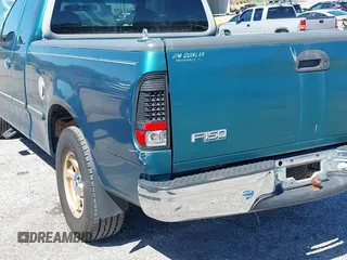 1998 Ford F-150 z VIN 1FTZX1725WNA75420, wystawiony jako IAAI lot #41775998 z przebiegiem 201 604 mil mil oraz . Historia ofert i sprzedaży dostępna na DreamBid. Obrazek 14.