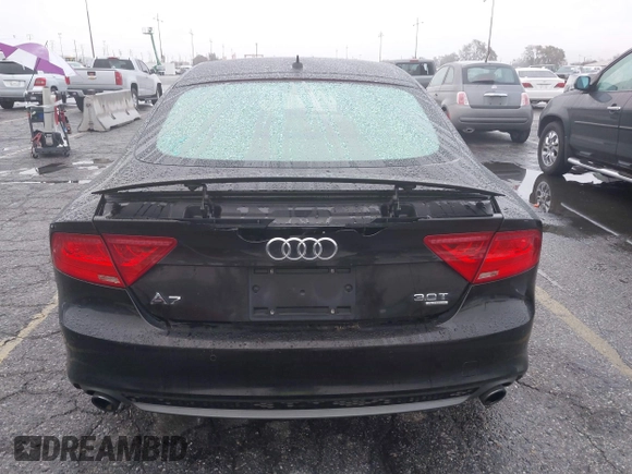 2014 Audi A7 3.0 Prestige with VIN WAU2GAFC5EN090233, listed as a IAAI auction lot 41565942 with 199,890 mi miles. Bid and sale history available at carsss.com. Image 17.