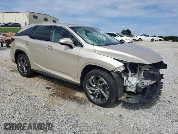 2018 Lexus RX 350L Premium with VIN JTJGZKCA9J2001848, listed as a Copart auction lot 61371135 with 60,459 mi miles and Salvage title. Bid and sale history available at DreamBid. Image 4.