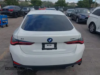 2023 BMW i4 eDrive40 z VIN WBY73AW02PFP24894, wystawiony jako IAAI lot #41097491 z przebiegiem 26 815 mil mil oraz . Historia ofert i sprzedaży dostępna na DreamBid. Obrazek 16.
