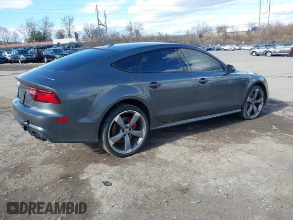 2018 Audi S7 Prestige with VIN WAU2FAFC6JN002741, listed as a IAAI auction lot 41457706 with 70,113 mi miles and . Bid and sale history available at DreamBid. Image 4.