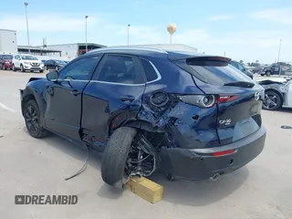 2024 Mazda CX-30 S Select Sport z VIN 3MVDMBBM1RM655682, wystawiony jako IAAI lot #42063971 z przebiegiem 6 771 mil mil oraz . Historia ofert i sprzedaży dostępna na DreamBid. Obrazek 3.