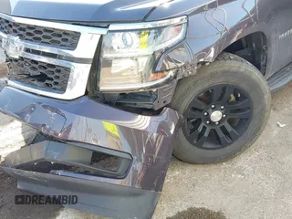 2015 Chevrolet Tahoe LS z VIN 1GNSCAKCXFR628303, wystawiony jako IAAI lot #42002698 z przebiegiem 152 141 mil mil oraz . Historia ofert i sprzedaży dostępna na DreamBid. Obrazek 6.