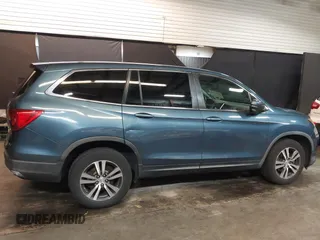 2016 Honda Pilot EX-L with VIN 5FNYF6H54GB105964, listed as a IAAI auction lot 42006560 with 110,466 mi miles. Bid and sale history available at carsss.com. Image 13.